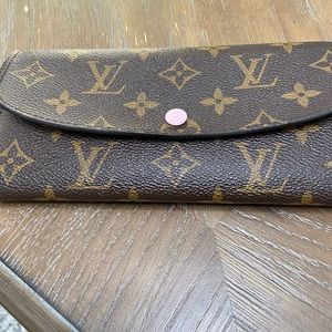 Louis Vuitton monogram wallet.